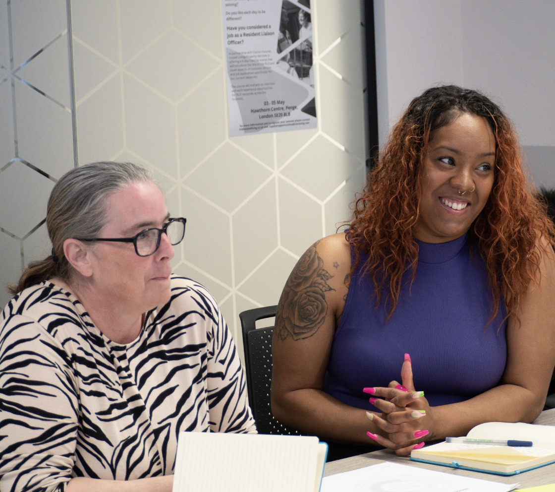 Our people discussion group smiling and talking