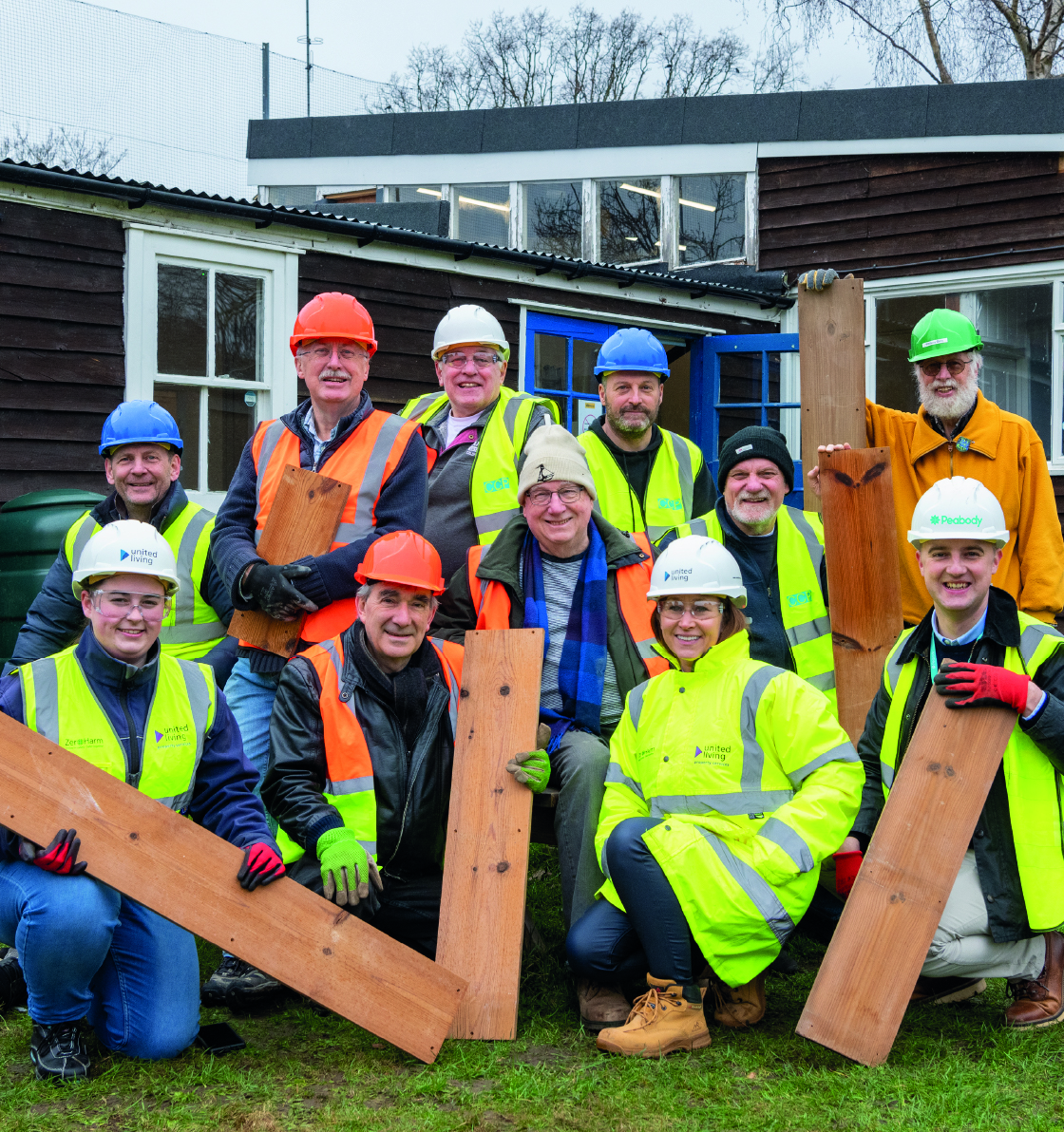 group of united living employees donating to sustainable charity