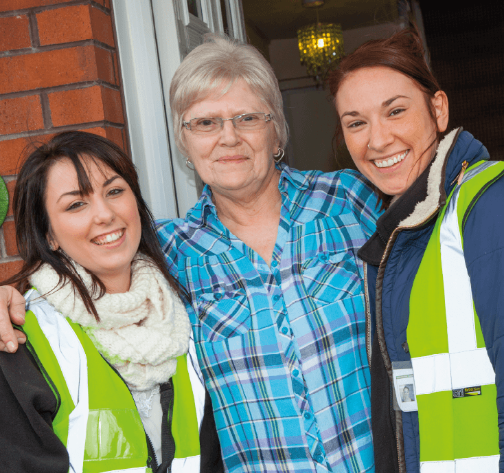 property services employees standing with resident