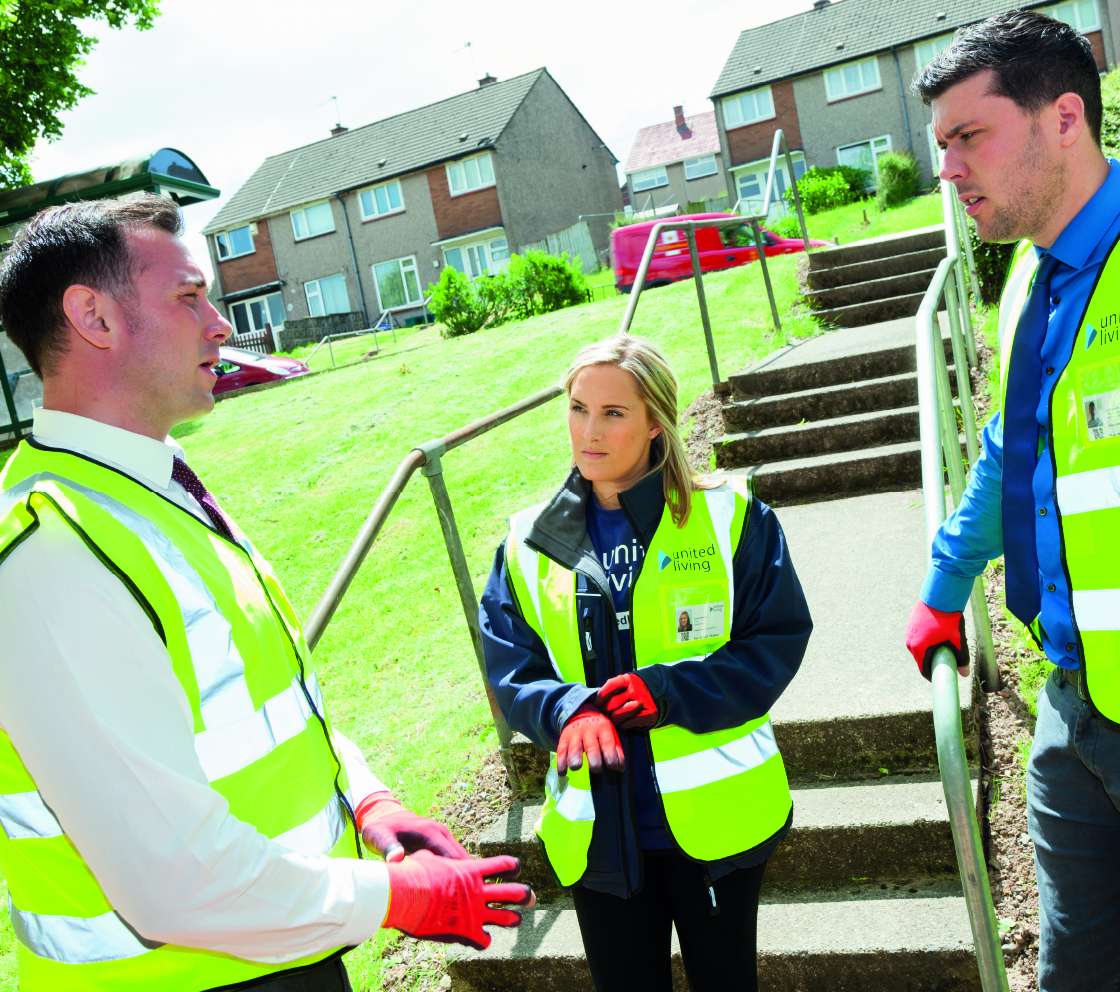 united living employees discussing sustainability improvements to local areas